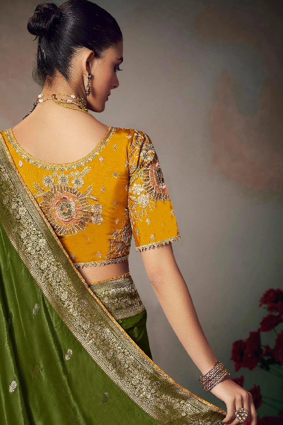 Faddism Kamini  Dark Green Silk Saree with Lace Border and Heavy Embroidered Blouse