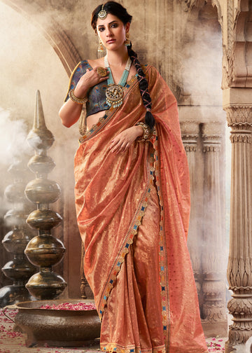 Faddism Kira Kavyasachi Melon Peach Pure Tissue Saree with Designer Blouse