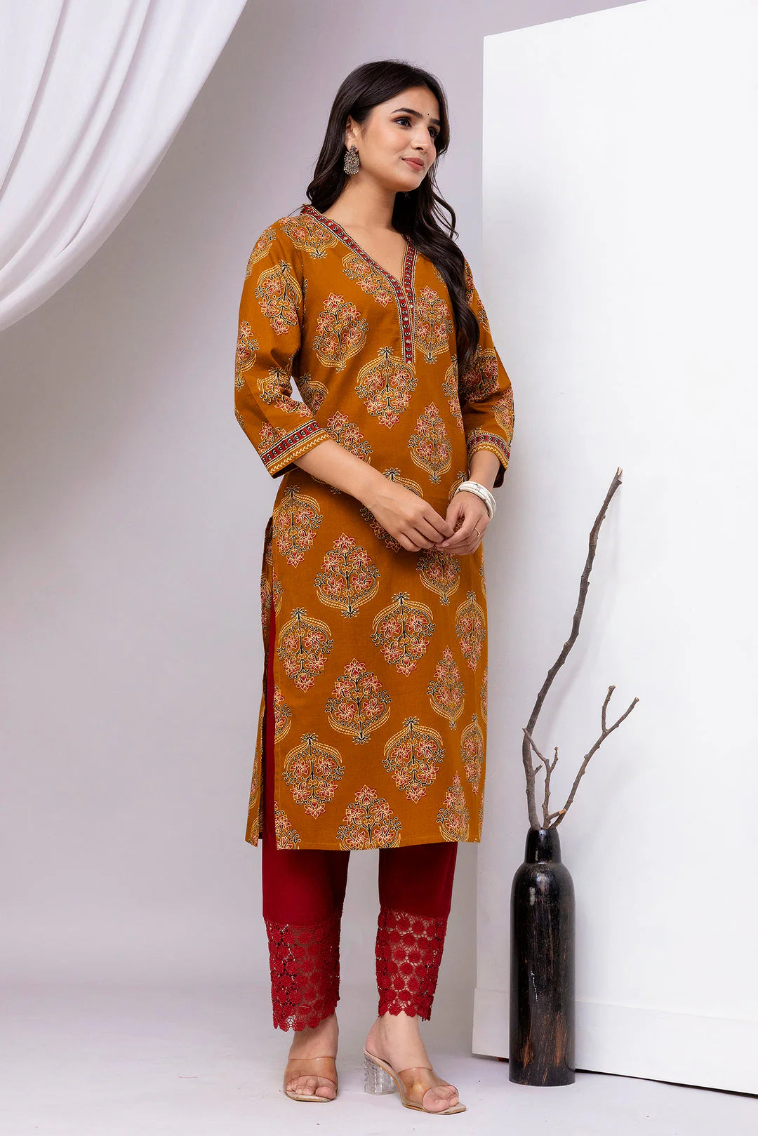 Mustard Printed Straight Kurta with Three-Quarter Sleeves for Women