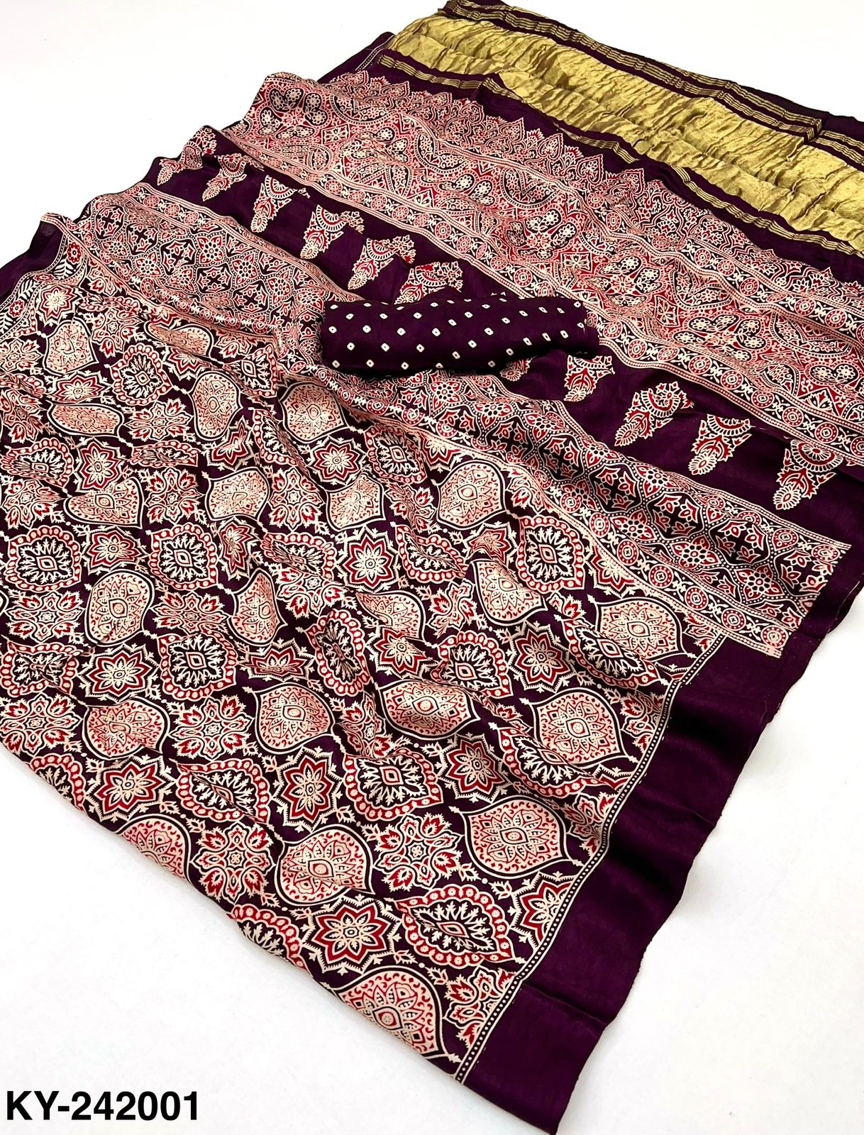 RajMata Keya Pure Modal Ajrakh Saree with Lagadi Patta & Handblock Print